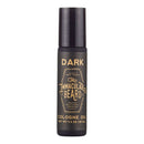 A compact black bottle labeled The Immaculate Beard and Premium Immaculate Alcohol Free Beard Cologne Oil For Men, featuring a net weight of 1/3 oz (10 mL), stands upright on a reflective surface—a travel-friendly fragrance in an easy-to-use rollerball format.