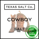 Two brown cowboy boots and a lasso with the text "Texas Salt Co. Cowboy Salt®," featuring award-winning Texas finishing salt from Texas Salt Co, plus a green International Flavor Awards Winner badge.