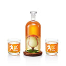 The Craftgen Baseball Decanter Set by Craftgen includes a whiskey decanter with a baseball inside and two glasses etched with a batter silhouette and “I’d Hit That”—a perfect baseball gift for fans.