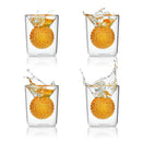 Craftgen Golf Ball Shot Glasses - Set of 4 by Craftgen feature round, orange golf ball-style objects in each glass. Three glasses show liquid splashing upward, all isolated on a white background for a dynamic presentation.