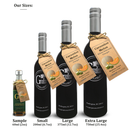 Four bottles of Georgetown Olive Oil Co. CUCUMBER MELON White Balsamic Vinegar | Barrel Aged, Modena ITALY, made with premium aged white balsamic vinegar from Modena, Italy. Available in Sample (60ml), Small (200ml), Large (375ml), and Extra Large (750ml) sizes, each bottle is adorned with a tan tag and silver cap, elegantly displayed against a white background.