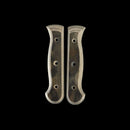 Two symmetrical Messermeister Custom Barnwood Mod Kit Handles - Large are displayed side by side on a black background, showcasing their dark wooden finish and multiple holes—perfect for customizing your chef’s knife.