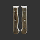 Two Messermeister Custom Barnwood Mod Kit Handles (Small) are shown side by side on a dark gray background, each with a curved shape and three screw holes.