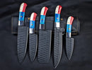 The Texan Knives Custom Hand Forged Carbon Steel Chef’s Knife Set includes 5 textured black blades with colorful red, blue, and ivory handles in a brown leather holder—ideal as the best anniversary gift for him.