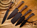 Texan Knives’ 5 Pcs Kitchen Knife Set features forged stainless steel blades, elegant rosewood handles, and a leather sheath—arranged on wood with rustic accents—making it a striking chef gift.