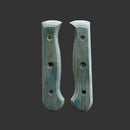 Two Messermeister Custom Indigo Mod Kit Handles (Medium), featuring three holes each and crafted from repurposed wood, are displayed side by side against a dark gray background.