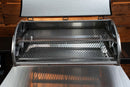 Open lid of a pellet grill revealing the Pimp My Grill® Gen2 Slide-Out Rack System - 2 Racks, which features two-tiered slide-out grill racks that expand cooking capacity.