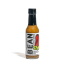 A 5 fl oz (148ml) bottle of California Hot Sauce Solutions J's Small Batch BEAN Chili Sauce, a flavorful mild hot sauce from California Hot Sauce Solutions. Its label features a large red chili illustration, black text, and an image of beans, reflecting its authentic Southern California origins.