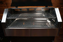 Two stacked metal mesh grill grates from the Pimp My Grill® Gen2 Slide-Out Rack System - 2 Racks forming a two-level cooking station inside an open Recteq RT-590 pellet grill.