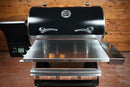 Pimp My Grill® Tactical Stainless Folding Front Shelf attached to a Recteq Deck Boss 590 pellet grill.