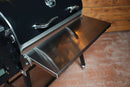 Pimp My Grill® Tactical Stainless Folding Front Shelf attached to the front of a black Recteq Patio Legend 410 grill.