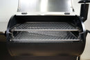 Two Pimp My Grill® Gen2 Slide-Out Rack System stainless steel racks installed inside an open Grilla Grills Silverbac pellet grill.