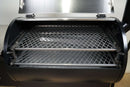 Two Pimp My Grill® Gen2 Slide-Out Rack System - 2 Racks metal grill racks stacked inside an open Grilla Grills Silverbac pellet smoker.