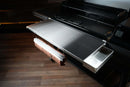 Pimp My Grill® Tactical Stainless Folding Front Shelf for the Traeger Ironwood XL, featuring an integrated paper towel holder and a side accessory tray for added grill prep space.