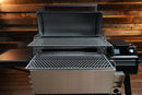 A black pellet grill featuring the Pimp My Grill® Gen2 Slide-Out Rack System - 2 Racks, with its lid open to reveal two stacked, slide-out stainless steel wire cooking grates that form a multi-level cooking platform.