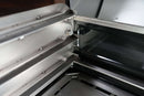 Interior view of a Traeger Ironwood XL grill featuring a Pimp My Grill® Gen2 Slide-Out Rack System - 2 Racks installed as a multi-level cooking platform with two metal slide-out racks along the side walls.