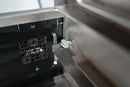 Close-up of a metal wing nut securing a Pimp My Grill® Gen2 Slide-Out Rack System - 2 Racks bracket to the interior wall of a Traeger Ironwood XL.