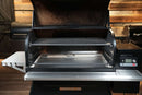 Open Traeger Timberline 1300 pellet grill with two Pimp My Grill® Gen2 Slide-Out Rack System grates installed.