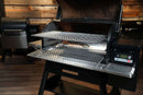 Traeger Timberline 1300 with an open lid, featuring the Pimp My Grill® Gen2 Slide-Out Rack System with two extended metal cooking racks.