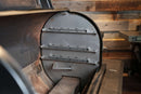 Inside the Traeger Timberline 1300, a Pimp My Grill® Gen2 Slide-Out Rack System - 2 Racks metal insert features a slide-out rack system with three horizontal sliding rails.