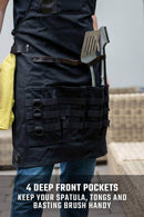 Dalstrong Heavy-Duty Waxed Canvas Pitmaster Apron with leather straps and utility pockets