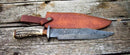 The Texan Knives Damascus Steel 1800s Bowie Knife – 15" features a stag horn handle, a Damascus steel guard, and comes with a leather sheath.