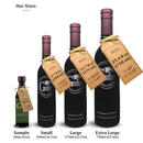 Four Georgetown Olive Oil Co. Wild Blueberry Balsamic Vinegar bottles in varying sizes—Sample (60ml), Small (200ml), Large (375ml), and Extra Large (750ml)—are displayed side by side, each featuring a brown tag with their volume and dimensions. These distinctive Georgetown Olive Oil Co. bottles are ideal for showcasing their premium blueberry balsamic vinegar, expertly crafted with aged balsamic vinegar from Modena, Italy.