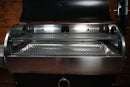 Recteq Deck Boss 590 with a Pimp My Grill® Gen2 Slide-Out Rack System featuring two stacked, metal wire cooking racks.