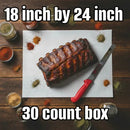 A rack of ribs with a knife rests on parchment paper set atop a Butcher BBQ Disposable Cutting Board (18″ x 24″), surrounded by jars of spices. The text highlights “18 inch by 24 inch” at the top and “30 Count” at the bottom—ideal for all your BBQ cutting board needs and effortless meat trimming from Butcher BBQ.