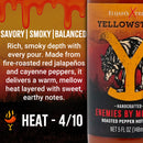A bottle of Elijah's Xtreme Enemies by Morning (Roasted Jalapeño) hot sauce from Elijah's Xtreme, featuring a bold wolf illustration. The label describes this roasted jalapeño hot sauce as offering a smoky, savory flavor profile with medium heat (4/10), highlighting notes of red jalapeños, cayenne pepper, and mellow sweetness.