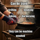 Wearing Butcher BBQ Extreme Heat Resistant Cooking Gloves, a person places a cast iron skillet on a smoky grill. Use for grilling, baking, smoking, or barbecuing. Machine washable.