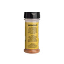 A plastic container of Hickman's BBQ Party Fowl Chicken Rub by Hickman's BBQ features a black lid and displays its back label with text, icons, and an ingredients list against a yellow background. The reddish-brown BBQ seasoning is visible inside the shaker, set against a plain white backdrop.