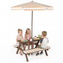 Three kids enjoy cupcakes at the DirectDeals Fir Wood Kids Picnic Table with 2 Built-in Benches and Umbrella, featuring striped cushions and an adjustable beige-striped umbrella, set against a plain white background.