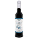 A dark glass bottle of Georgetown Olive Oil Co. Fish Marinade, featuring a white cap and a label illustrated with two fish, infuses your seafood dishes with vibrant Mediterranean citrus flavors.