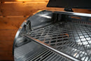 Metal slide-out carbon steel grates from the Pimp My Grill® Gen2 Slide-Out Rack System - 1 Rack installed inside the cylindrical chamber of a Recteq Flagship 1100 grill.