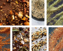 A vibrant collage of the World Spice Americana Tasting Flight by World Spice showcases an array of aromatic blends—featuring mixtures of seeds, herbs, dried vegetables, and powdered seasonings in a spectrum of colors and textures—perfect for inspiring your own spice tasting adventure at home.