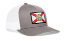 The Haka Hat Florida Flag Trucker Hat | Black FL Snapback features a mesh back, state flag patch on the front, and stylish snapback design—perfect for any Haka Hat collector.