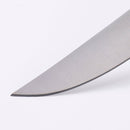 Close-up of the tip of a Messermeister Folding Steak Knife from the 4 Piece Set in Leather Roll, shown against a plain white background.