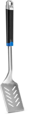 The Napoleon Grills Essential Series (GATL003) Grill Spatula features a black and blue handle with a slotted, slightly serrated head—perfect for expertly flipping and lifting food. An essential BBQ tool for grilling enthusiasts.