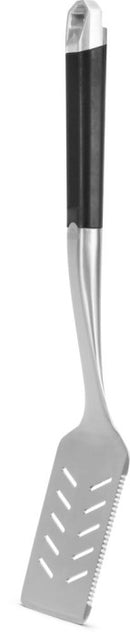The Napoleon Grills Premium Grill Spatula PRO Series (GATL007) is a stainless steel spatula with a black handle, slotted holes, and a serrated edge on one side.