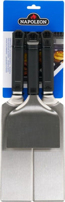 The Napoleon Griddle Starter 3-Piece Set (GATL012) by Napoleon Grills features three stainless steel spatulas with black handles on a blue and white card backing—ideal griddle tools for any barbecue enthusiast.