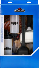 A blue Napoleon Grills box labeled "Napoleon Griddle 4-Piece Cleaning Kit for Griddles (GATL013)" contains two squeeze bottles, a spatula, and a basting brush, visible through a clear plastic window.