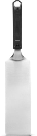 The Napoleon Griddle Spatula for Griddles (GATL014) by Napoleon Grills features a stainless steel blade and a long, heat-resistant black handle, shown against a white background.