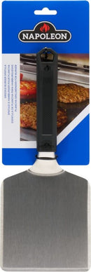 The Napoleon Griddle Burger Spatula (GATL015) by Napoleon Grills features a stainless steel blade, black handle, and comes in blue and white packaging with grilled burgers shown—perfect as a wide spatula for flipping burgers and more.