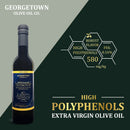 A bottle of Georgetown Olive Oil Co. Koroneiki (GREECE) Extra Virgin Olive Oil is shown with text emphasizing its high polyphenol content (580 mg/kg), robust flavor, and low FFA: 0.16%. Crafted from Greek Koroneiki olives and first cold pressed, this extra virgin olive oil features a design that highlights “HIGH POLYPHENOLS EXTRA VIRGIN OLIVE OIL.”.
