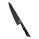 The Spaceman Knives Galaxy Series Kiritsuke Knife, featuring a dark marbled handle, hovers above a swirling galaxy, its precision blade poised near a bright cosmic center.