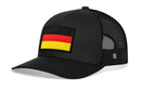 The Haka Hat German Flag Trucker Hat by Haka Hat is a black snapback with a mesh back and front patch featuring the German flag’s black, red, and yellow stripes.