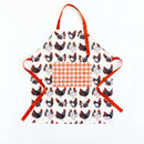 The Gingiber Chicken Apron by Gingiber features a charming cotton design with black chickens, red combs, an orange and white checkered pocket, and matching adjustable orange ties, displayed flat on a white background.