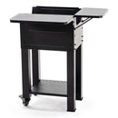 The Green Mountain Grills Trek Cart 2.0 features a black metal flat top, foldable side extensions, four legs, a lower perforated shelf, and caster wheels—ideal as an outdoor grill cart from Green Mountain Grills.