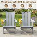 Two gray DirectDeals Adirondack Chair with Cup Holder - HDPE Outdoor Seating sit on a stone patio, featuring weatherproof, fade-resistant, waterproof durability and built to last.